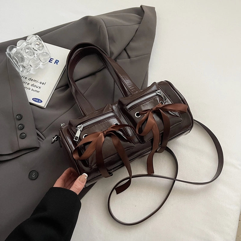 Women's Pu Leather Solid Color Bow Knot Classic Style Cylindrical Zipper Crossbody Bag