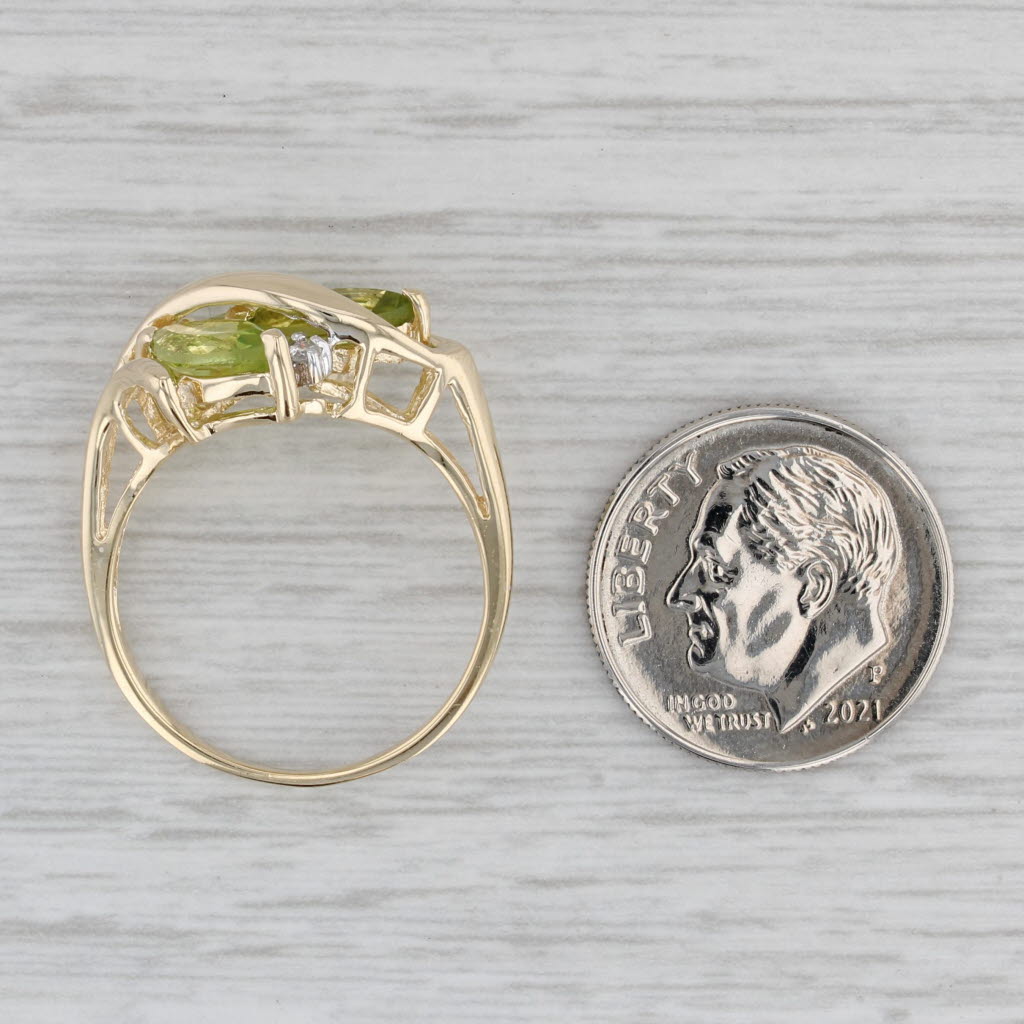 1.96ctw Peridot 3-Stone Ring 14k Yellow Gold Size 7.75 Diamond Accent