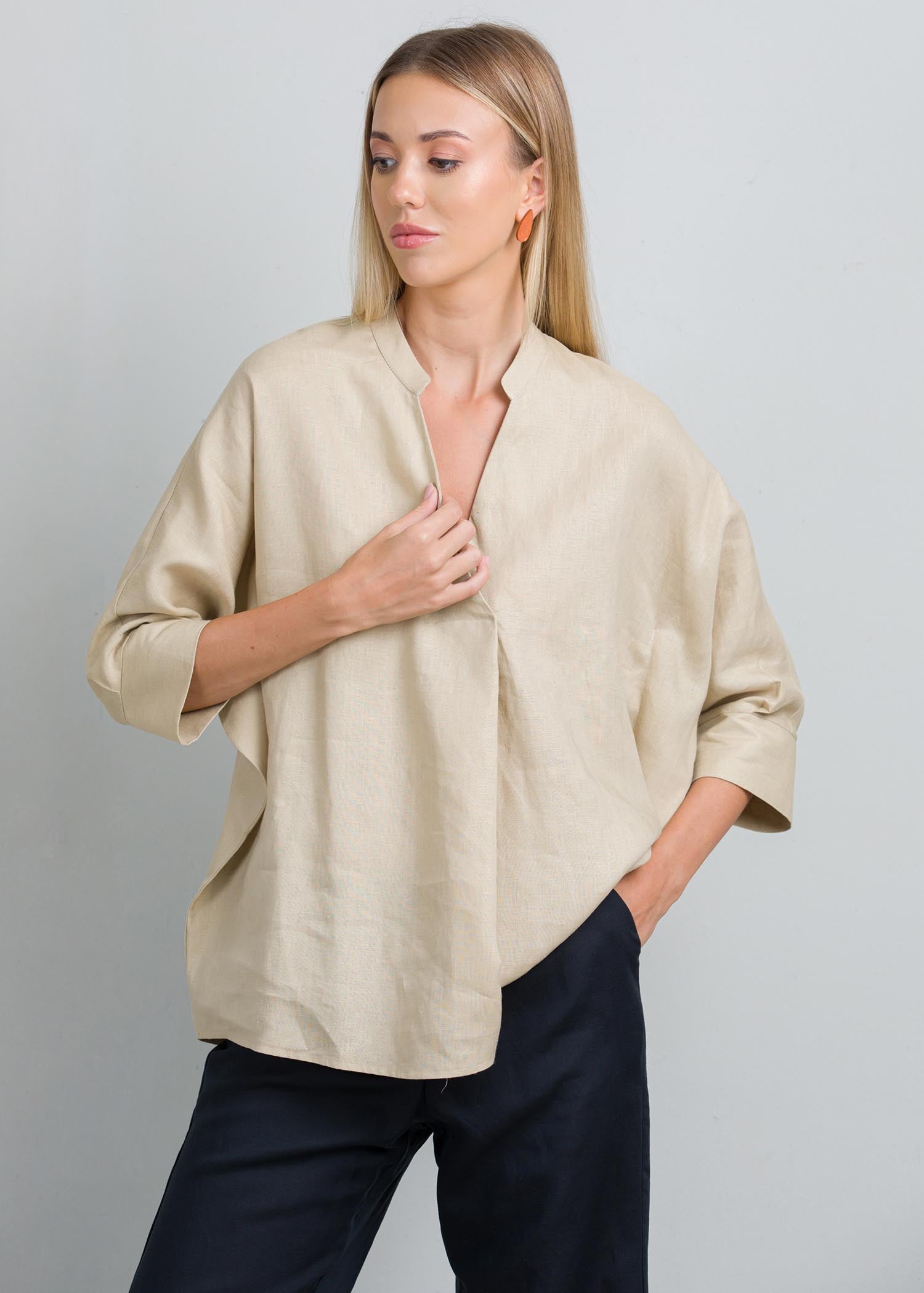 Oversized blouse with front pleat