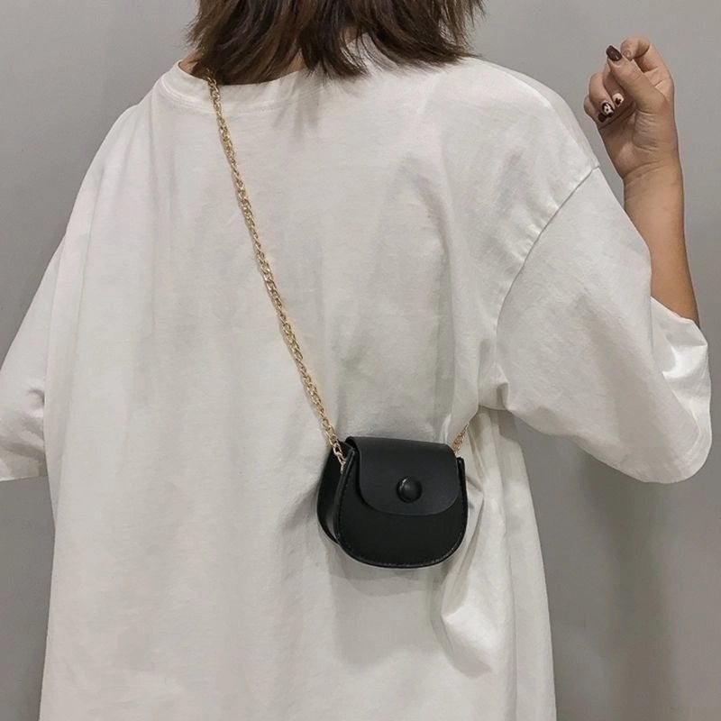 Women's Mini Pu Leather Solid Color Streetwear Oval Flip Cover Crossbody Bag