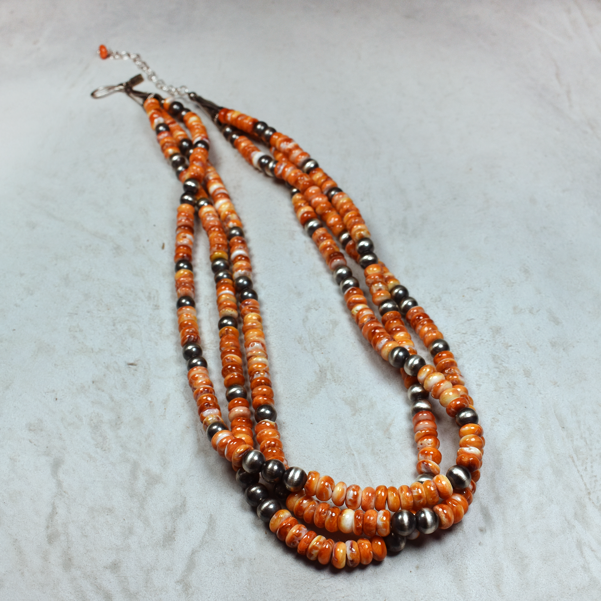 22 Spiny Oyster and Sterling Silver Three Strand Necklace