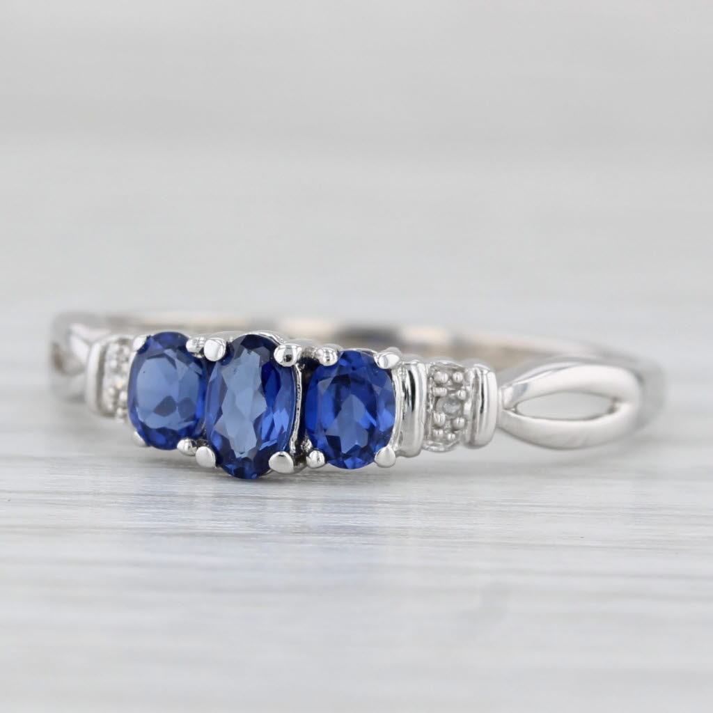 0.95ctw Lab Created Sapphire 3-Stone Ring 10k White Gold Size 9 Diamond Accents