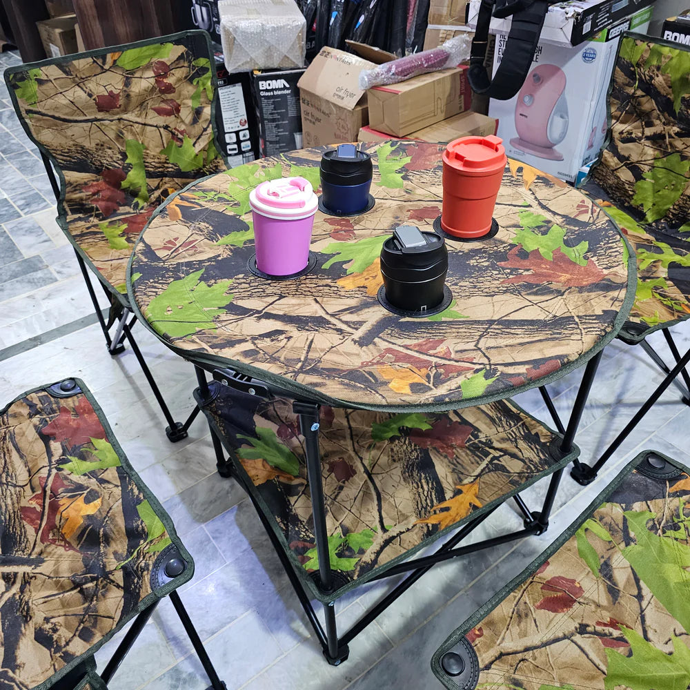 A SET OF FOUR CHAIRS AND A TABLE
