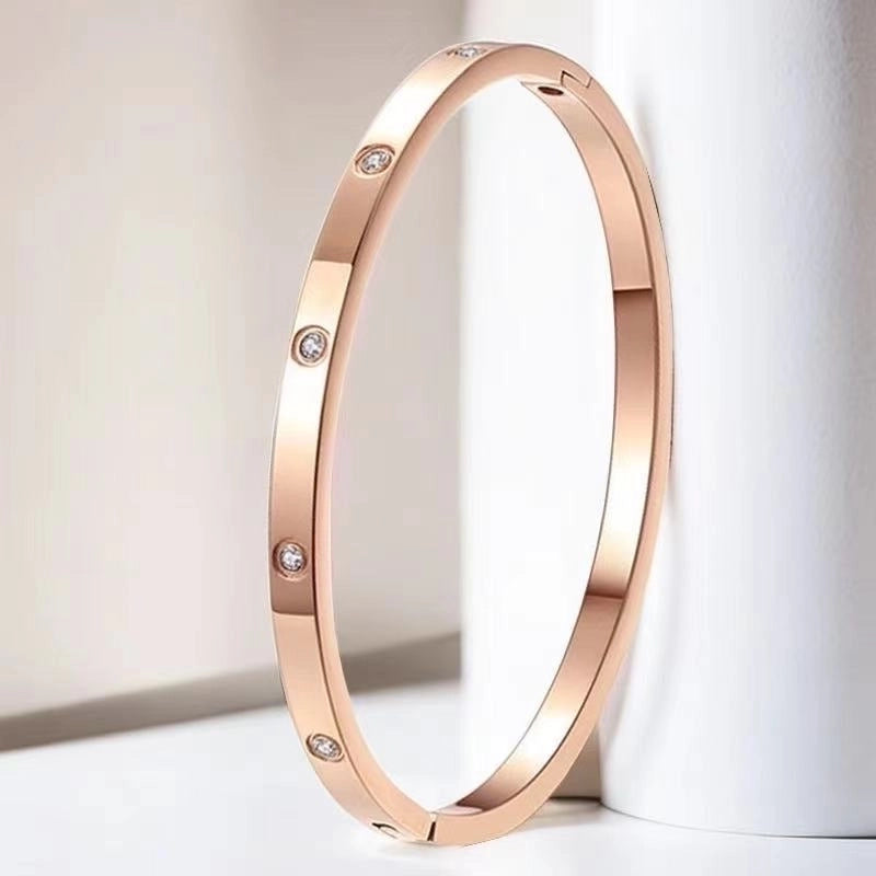 Retro Round Titanium Steel Inlay Zircon Bangle
