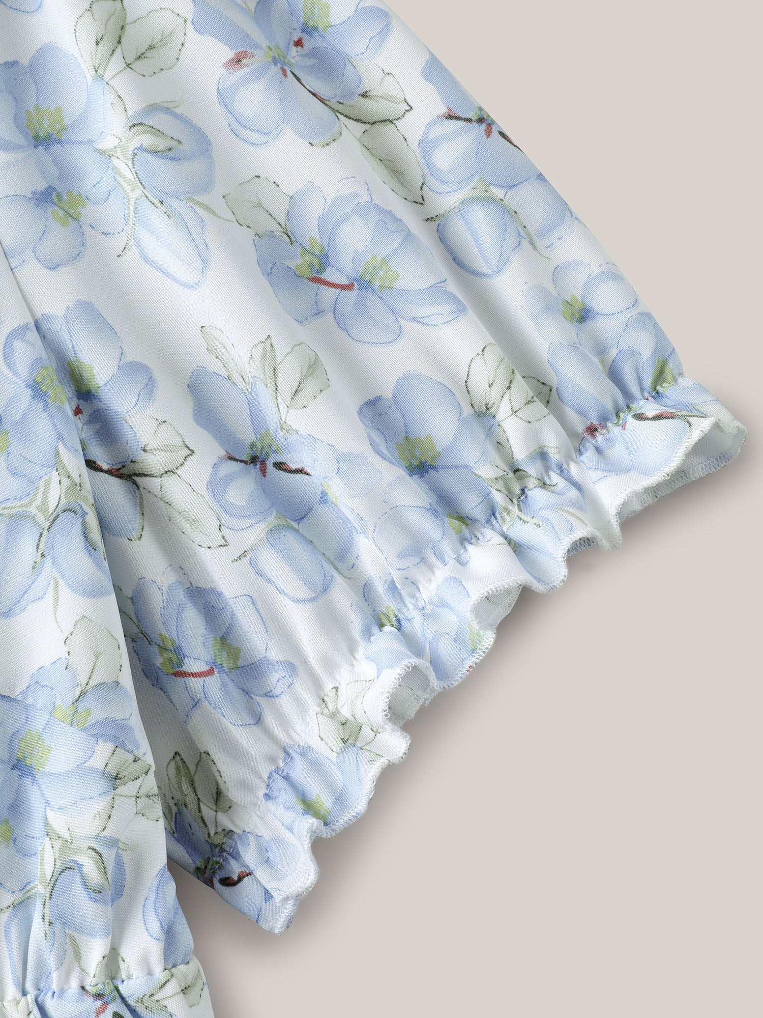 Breezy Floral Print Drawstring Babydoll Top