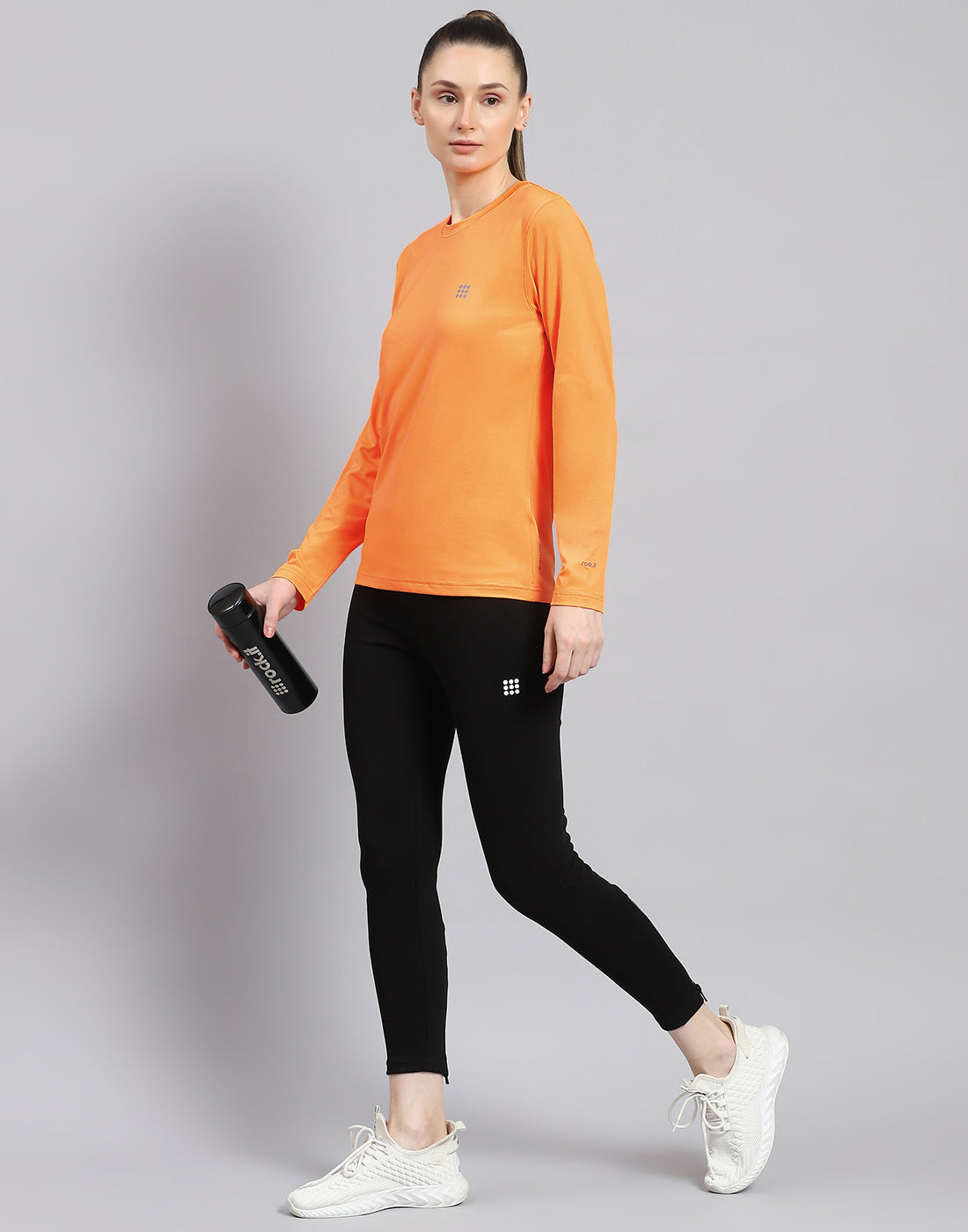 Women Orange Solid Round Neck Full Sleeve Top