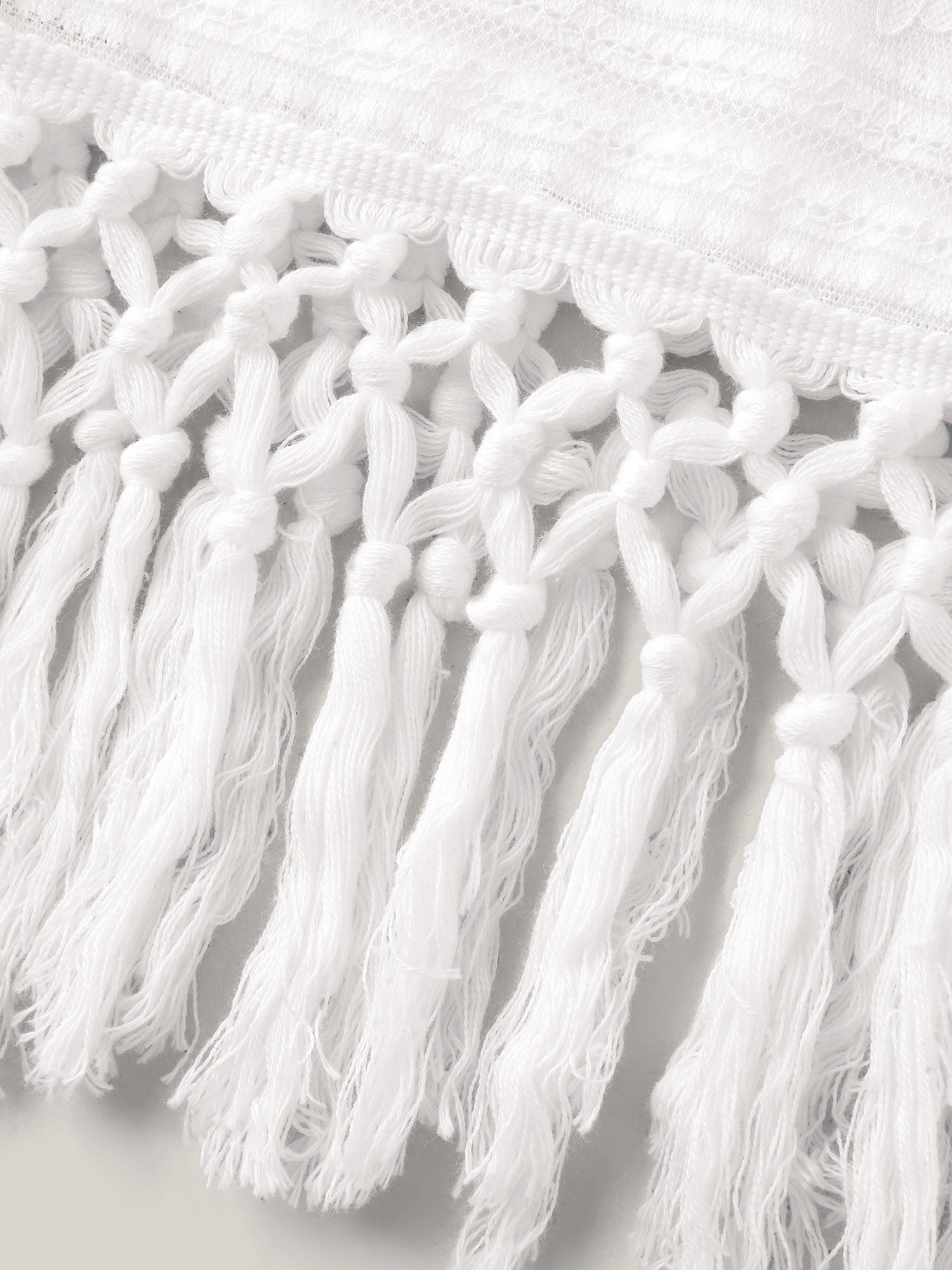 Stretchy Lace Tassel Hem Solid Top