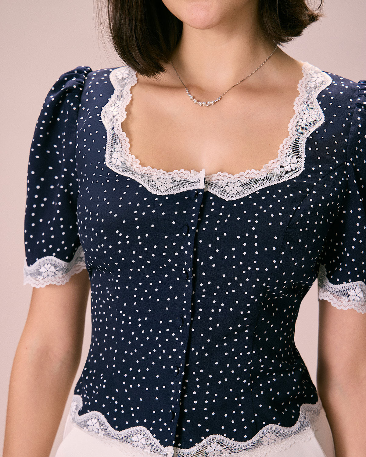 The Navy Polka Dot Lace Puff Sleeve Blouse