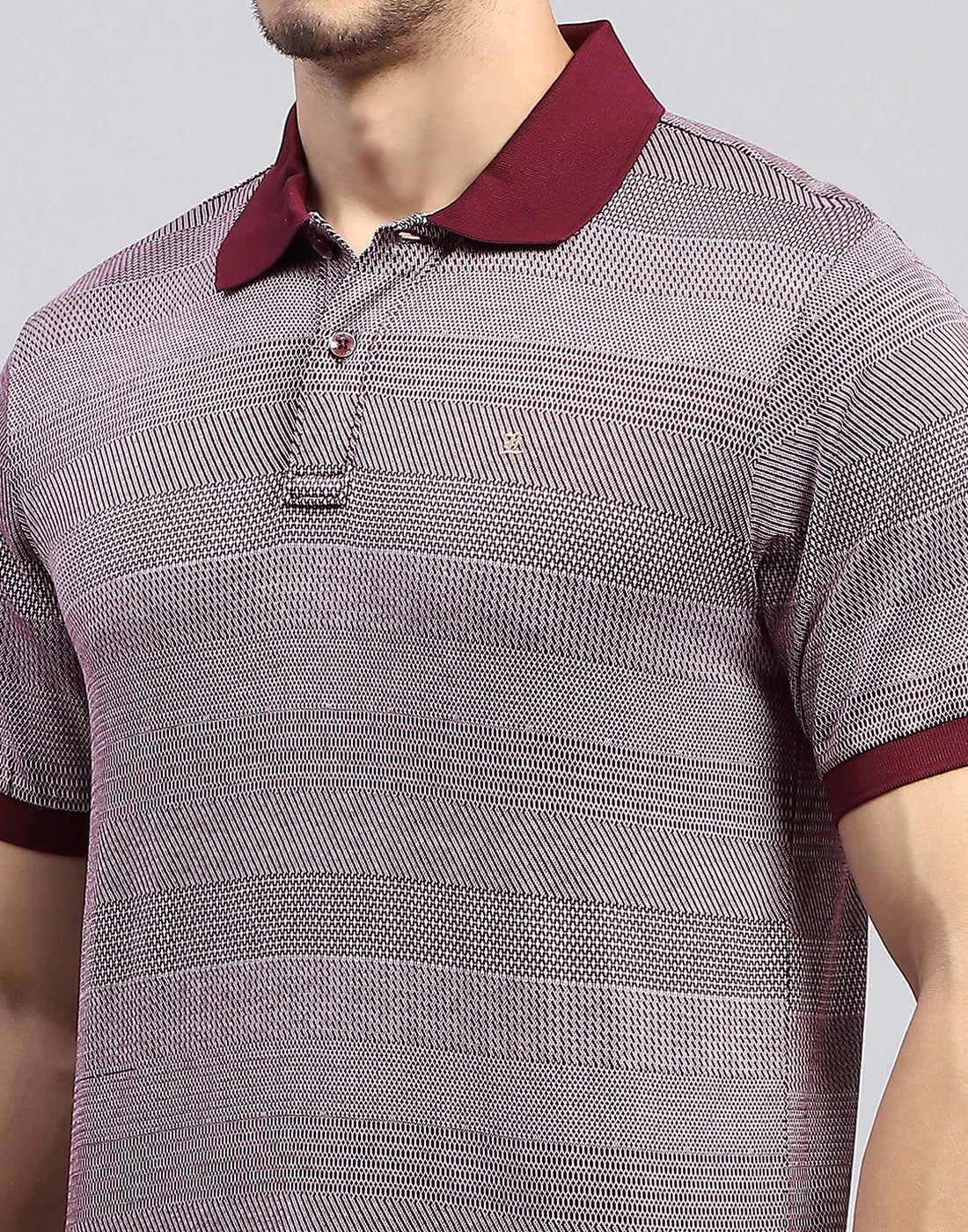 Men Maroon Self Design Polo Collar Half Sleeve T-Shirt