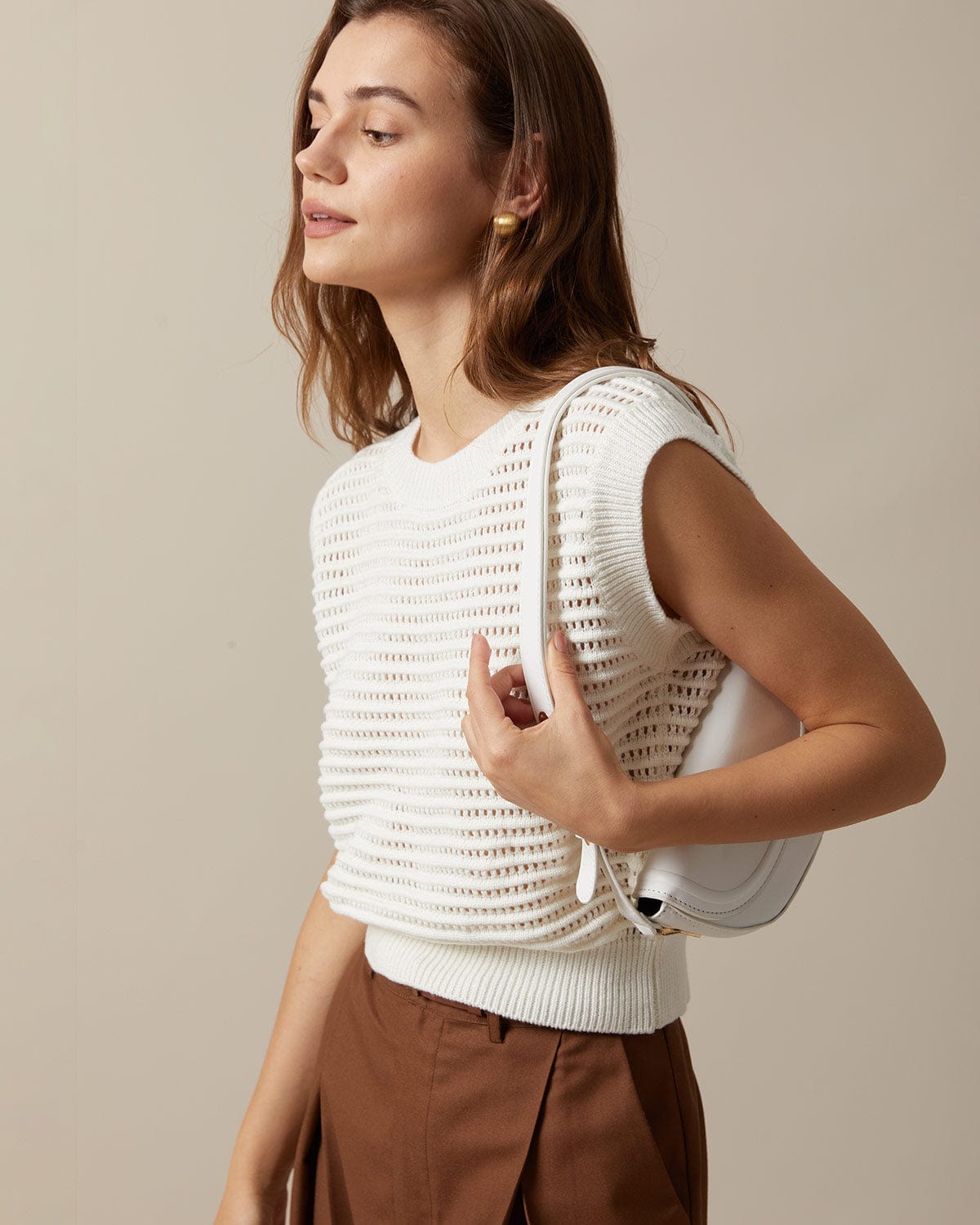 The Beige Sleeveless Pointelle Ribbed Knit Vest