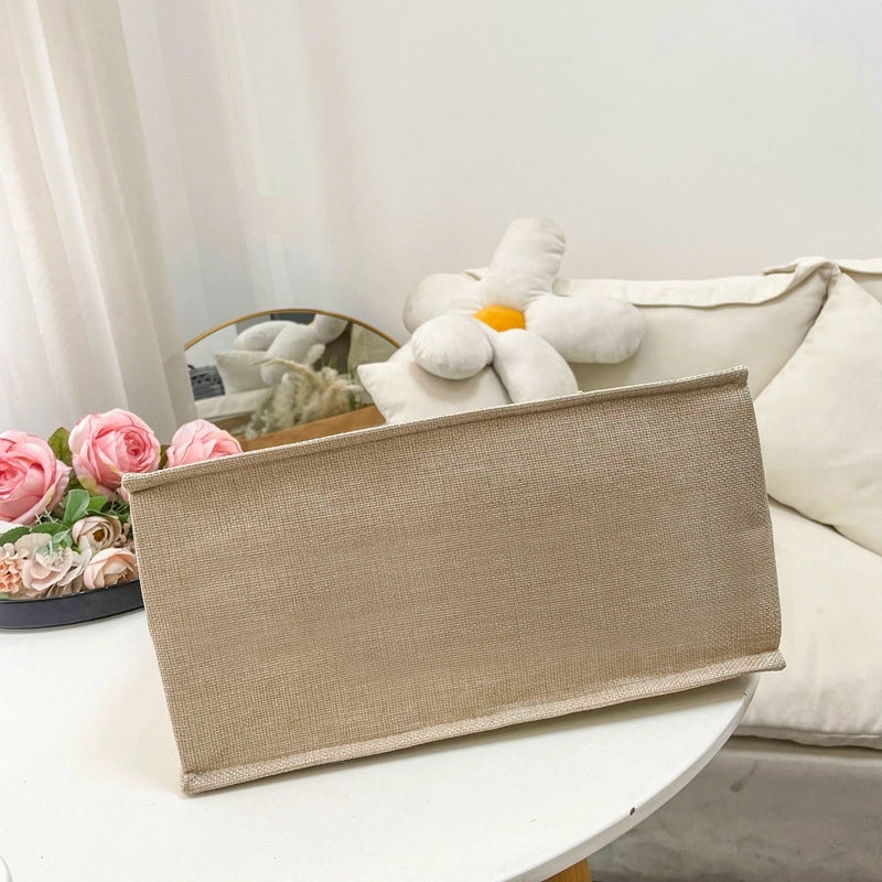 Women's Medium Cotton And Linen Letter Flower Streetwear Magnetic Buckle Tote Bag