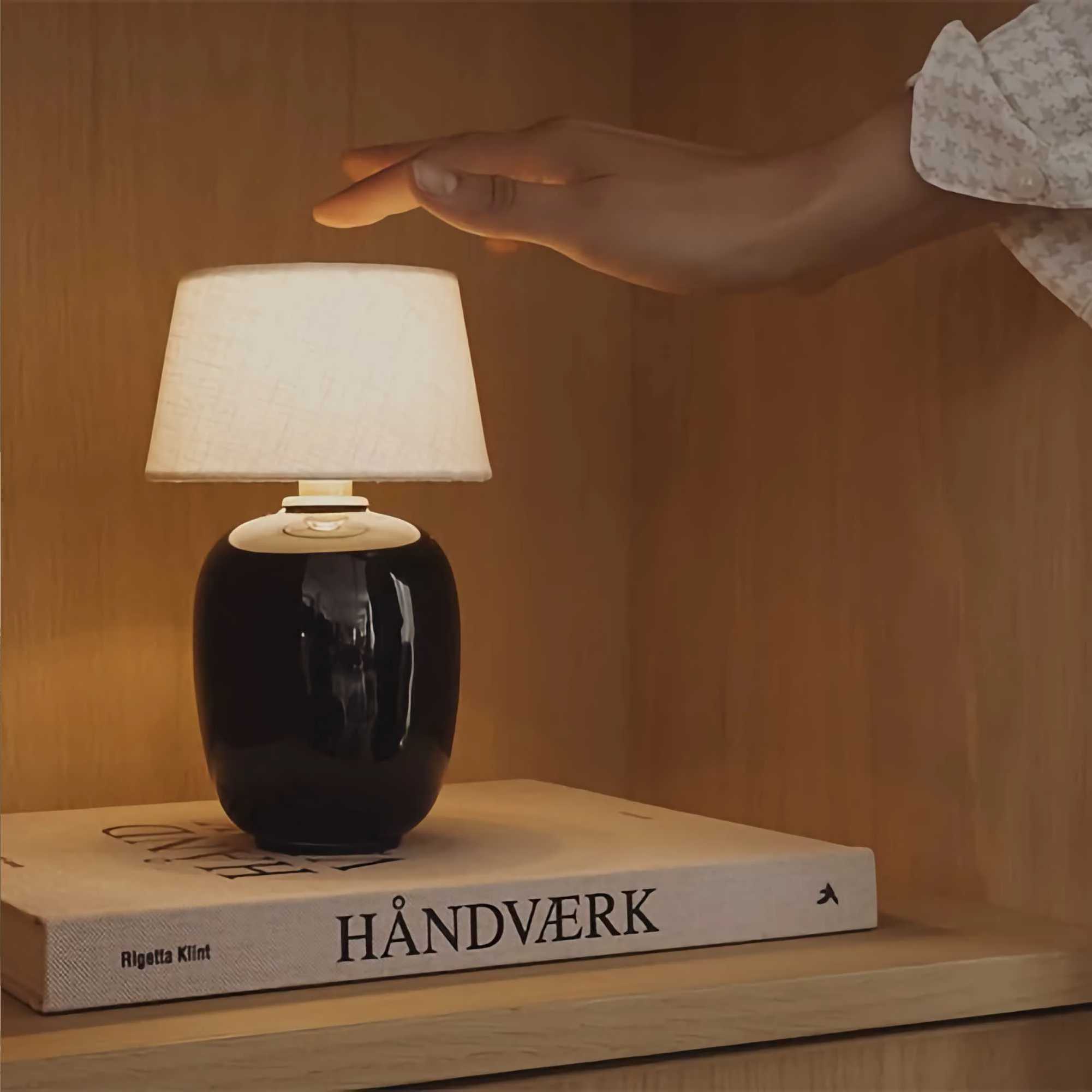 Copenhagen Torso portable table lamp. Black