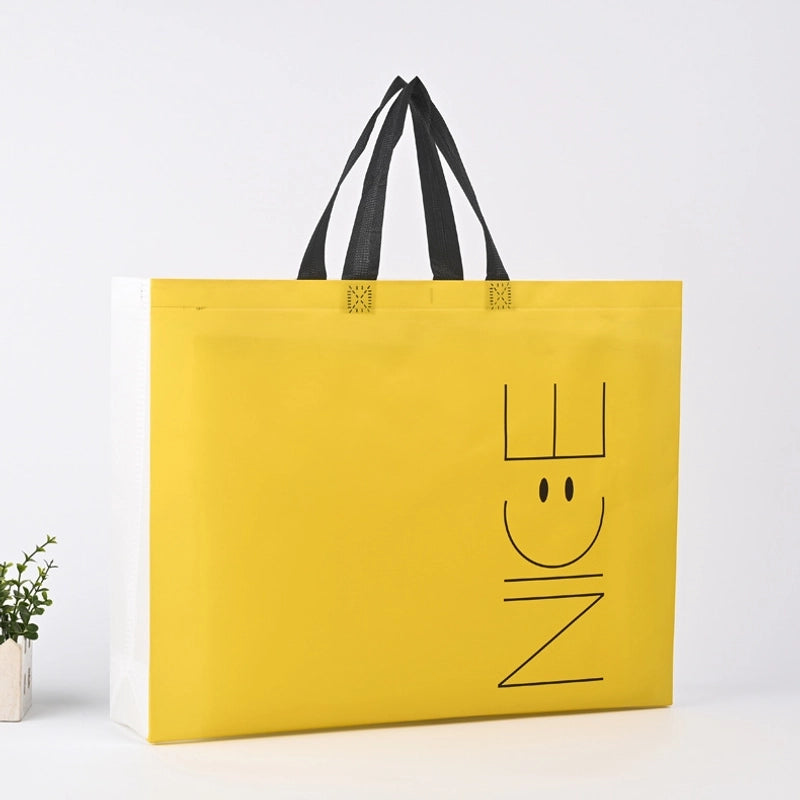 In Stock Hot-pressed Non-woven Clothing Bag Smile Face Facial Expression Bag Color Printing Children's Clothing Bag Advertising Handbag Printing LO