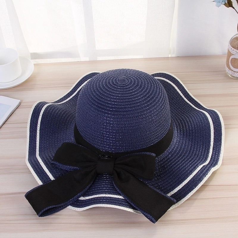 Women's Elegant Pastoral Minimalist Waves Bowknot Big Eaves Straw Hat
