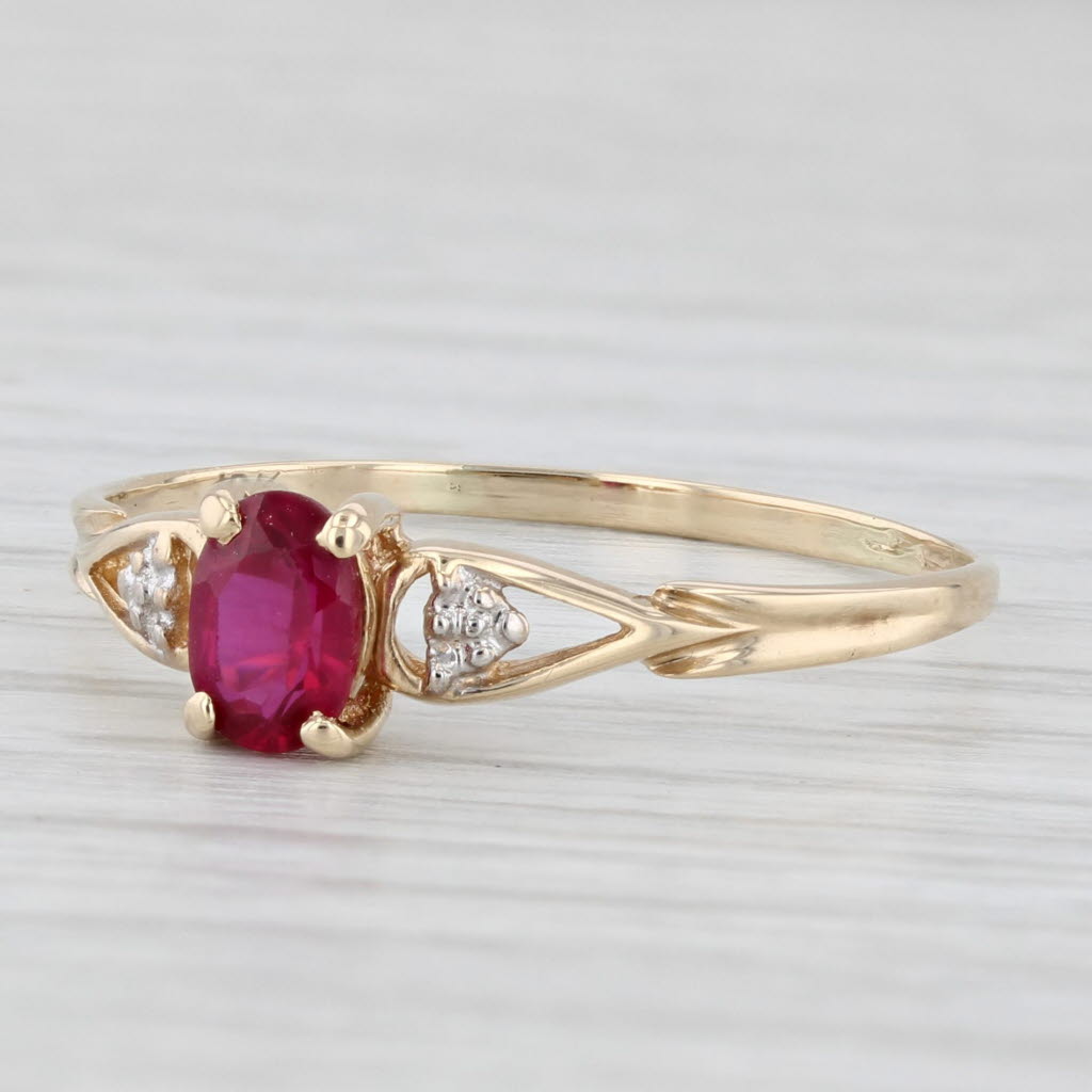 0.50ctw Oval Lab Created Ruby Ring 10k Yellow Gold Size 10.75