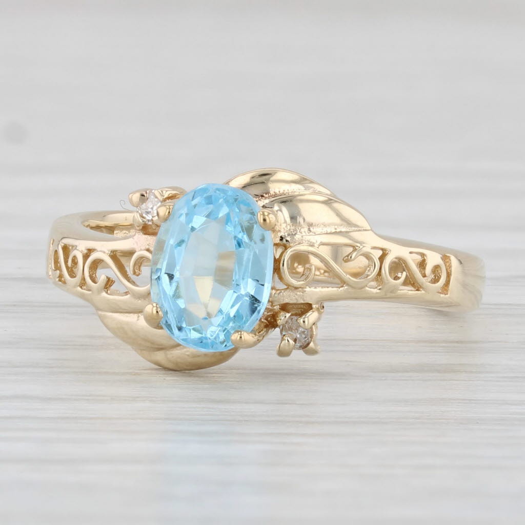 1.02ctw Oval Blue Topaz Diamond Ring 10k Yellow Gold Size 6.25