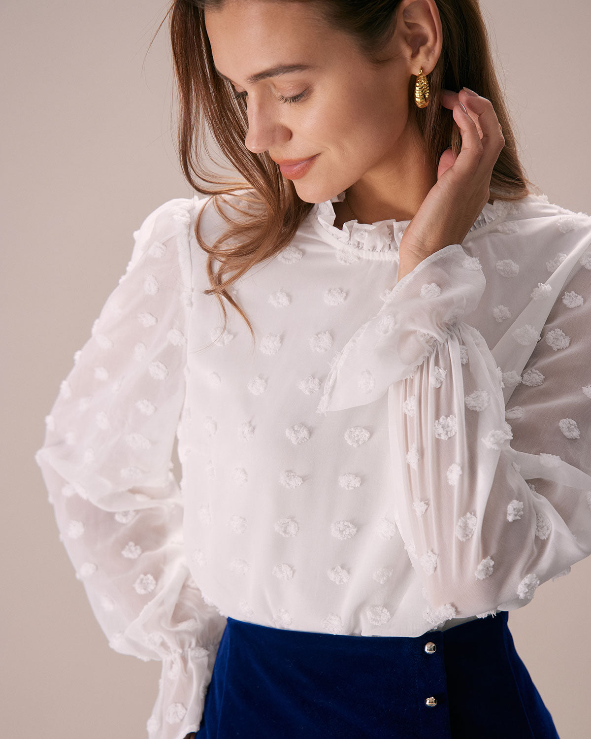 The White Mock Neck Dobby Sheer Blouse
