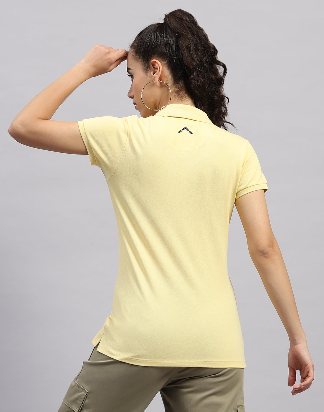 Women Yellow Solid Polo Collar Half Sleeve T Shirt