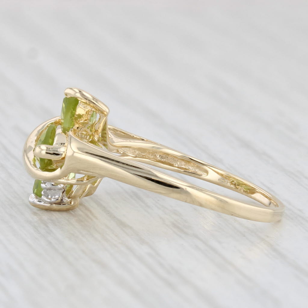 1.96ctw Peridot 3-Stone Ring 14k Yellow Gold Size 7.75 Diamond Accent