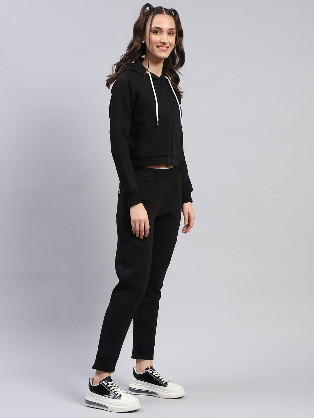 Women Black Solid Hooded Full Sleeve Tracksuit