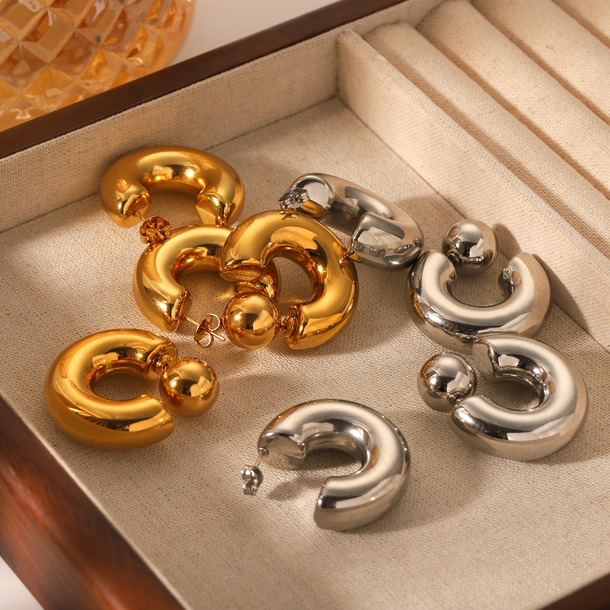 Insc-Shaped Stainless Steel Hollow Earrings For Women Niche Design Spherical Titanium Steel Earrings