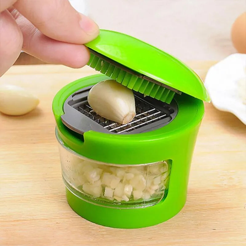 MINI GARLIC PRESSER