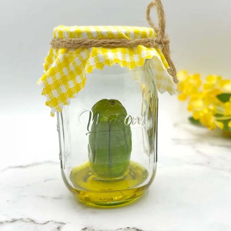 Grumpy Pickle in a Jar sculpture