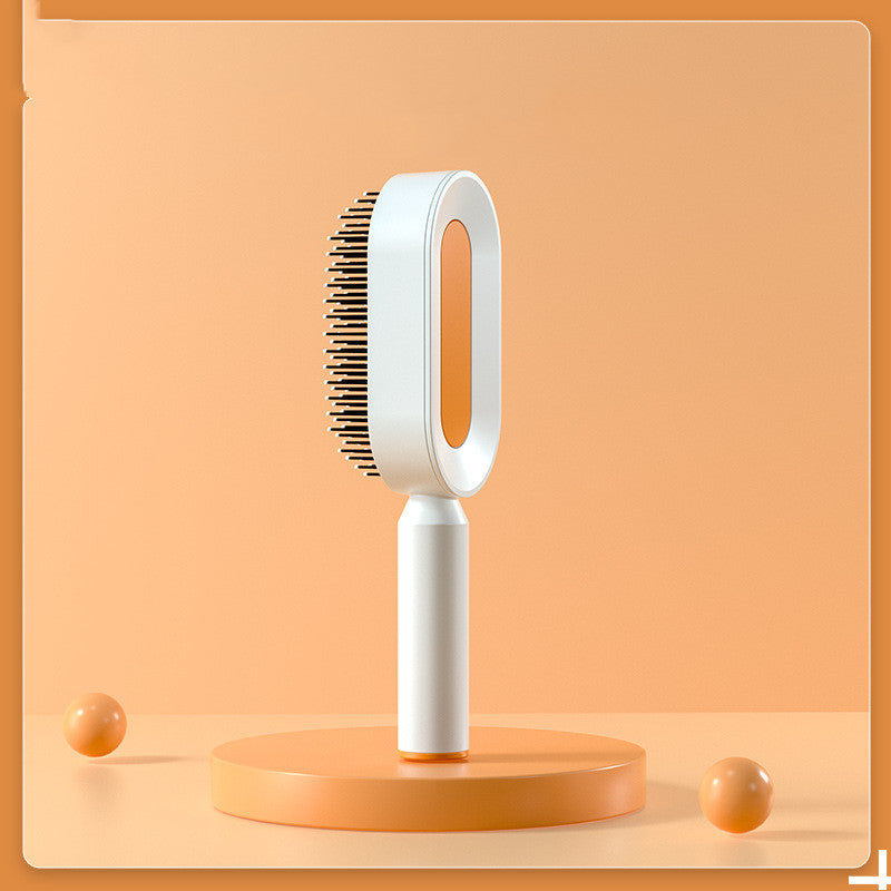 Self-cleaning hairbrush for women. One-button cleaning airbag to prevent hair loss