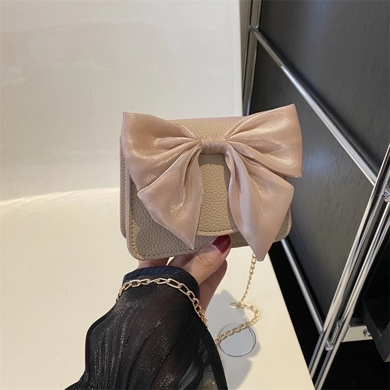 Women's Pu Leather Solid Color Bow Knot Streetwear Square Flip Cover Crossbody Bag