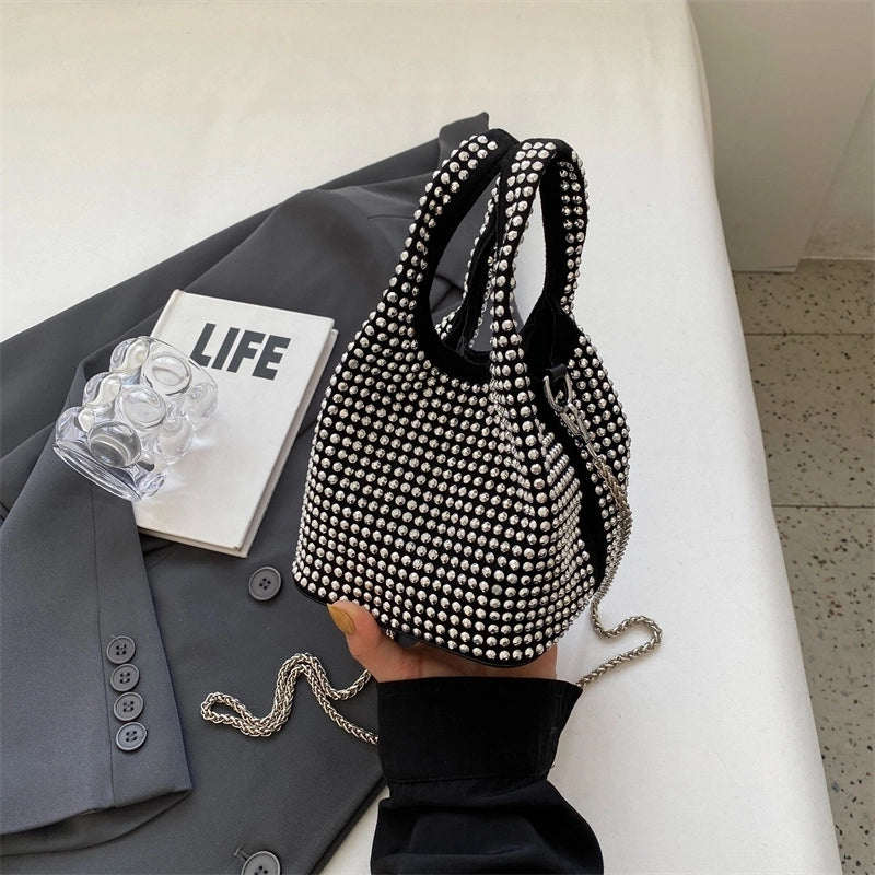 Women's Pu Leather Solid Color Streetwear Bucket Magnetic Buckle Handbag