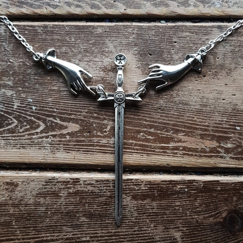 Hand With Sword Necklace
