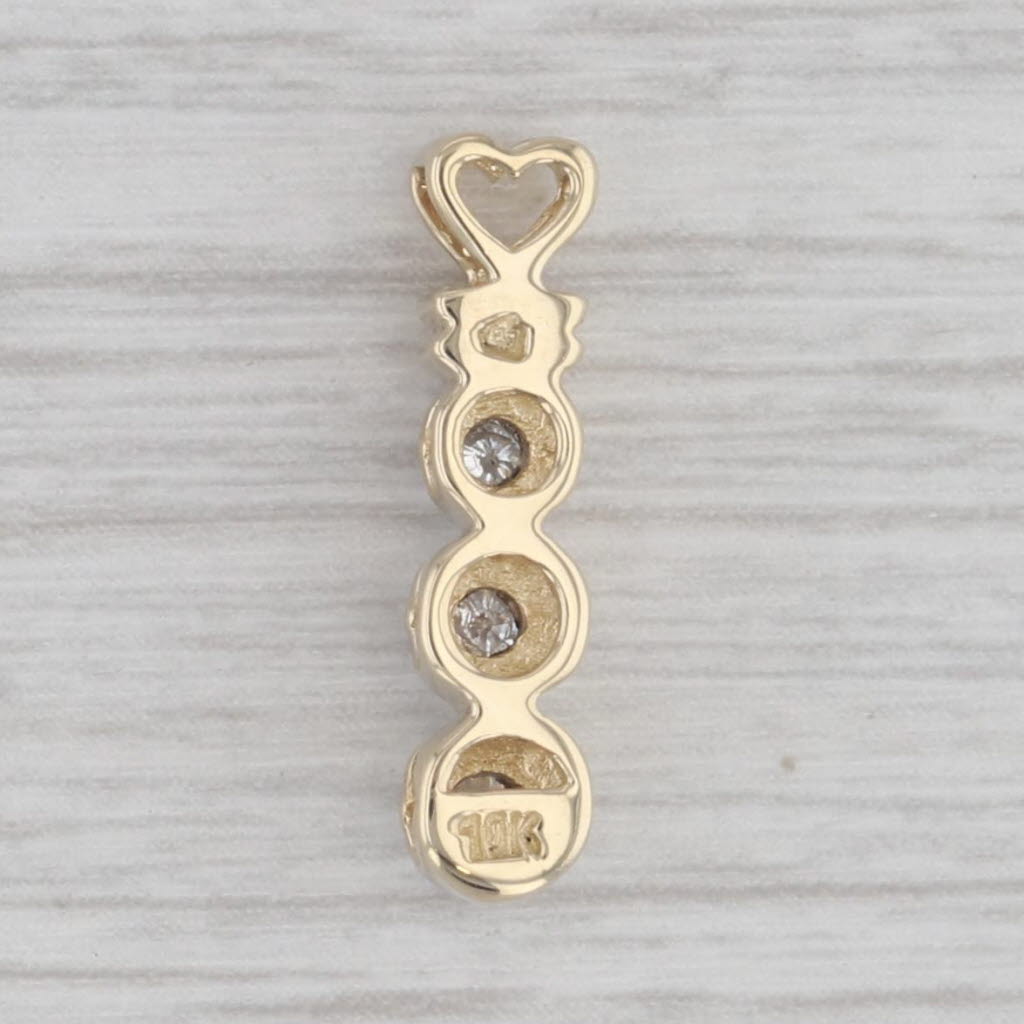 0.10ctw Diamond 3-Stone Journey Heart Pendant 10k Yellow Gold Small Drop