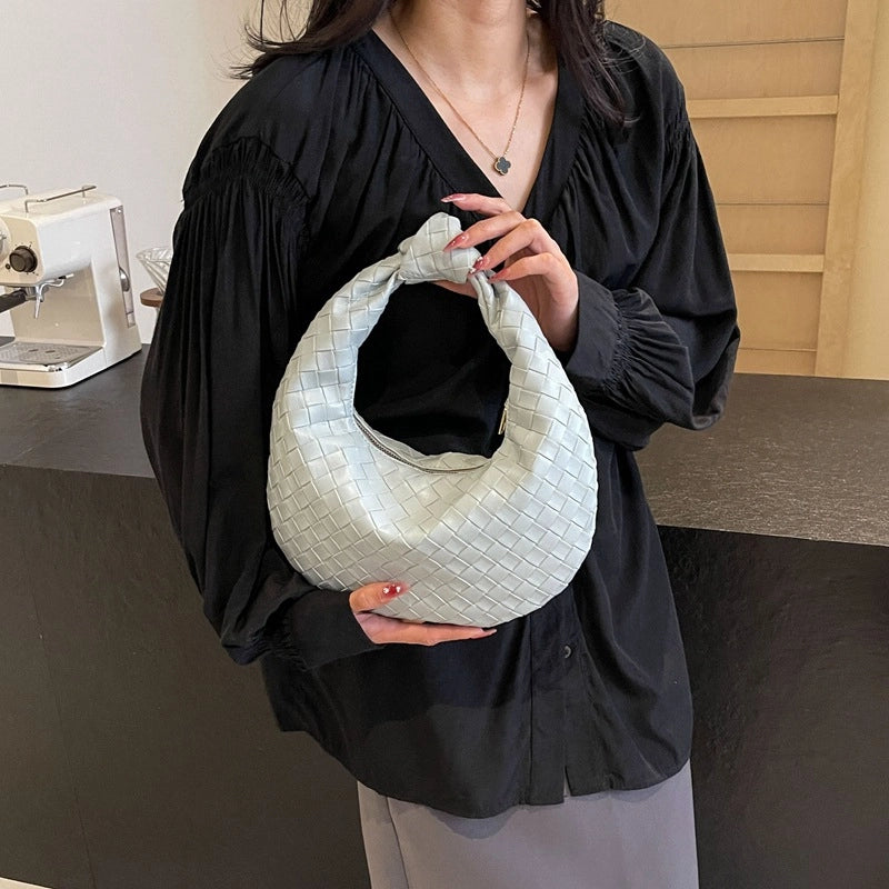 Women's PU Solid Color Classic Style Streetwear Weave Dumpling Shape Zipper Handbag