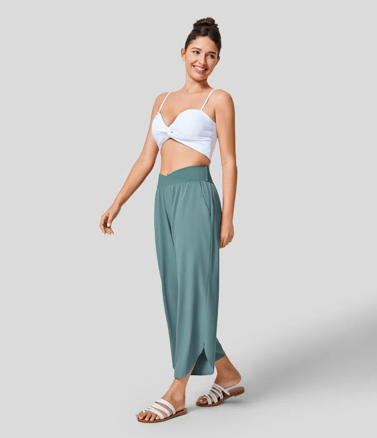 Breezeful™ crossover pants with high waistband and pleated side pockets