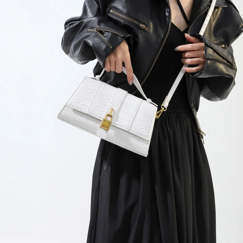Women's Pu Leather Solid Color Punk Classic Style Streetwear Sewing Thread Square Magnetic Buckle Flip Cover Handbag