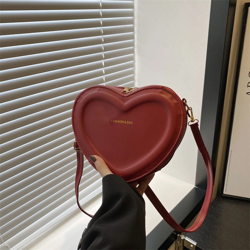 Women's Pu Leather Solid Color Cute Sewing Thread Heart-shaped Zipper Crossbody Bag