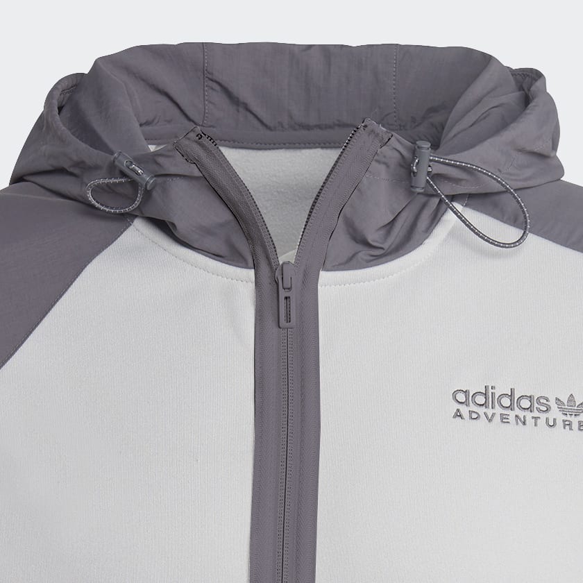 SUDADERA CON GORRO ADIDAS ADVENTURE WINTER FABRIC MIXcuidado INSTRUCCIONES DE LAVADO No usar blanqueador Puede utilizarse secadora en tempratura baja. No lavar en seco. Planchar a temperatura baja. Lavar a máquina en temperatura fría. INFORMACIÓN ADICIONA