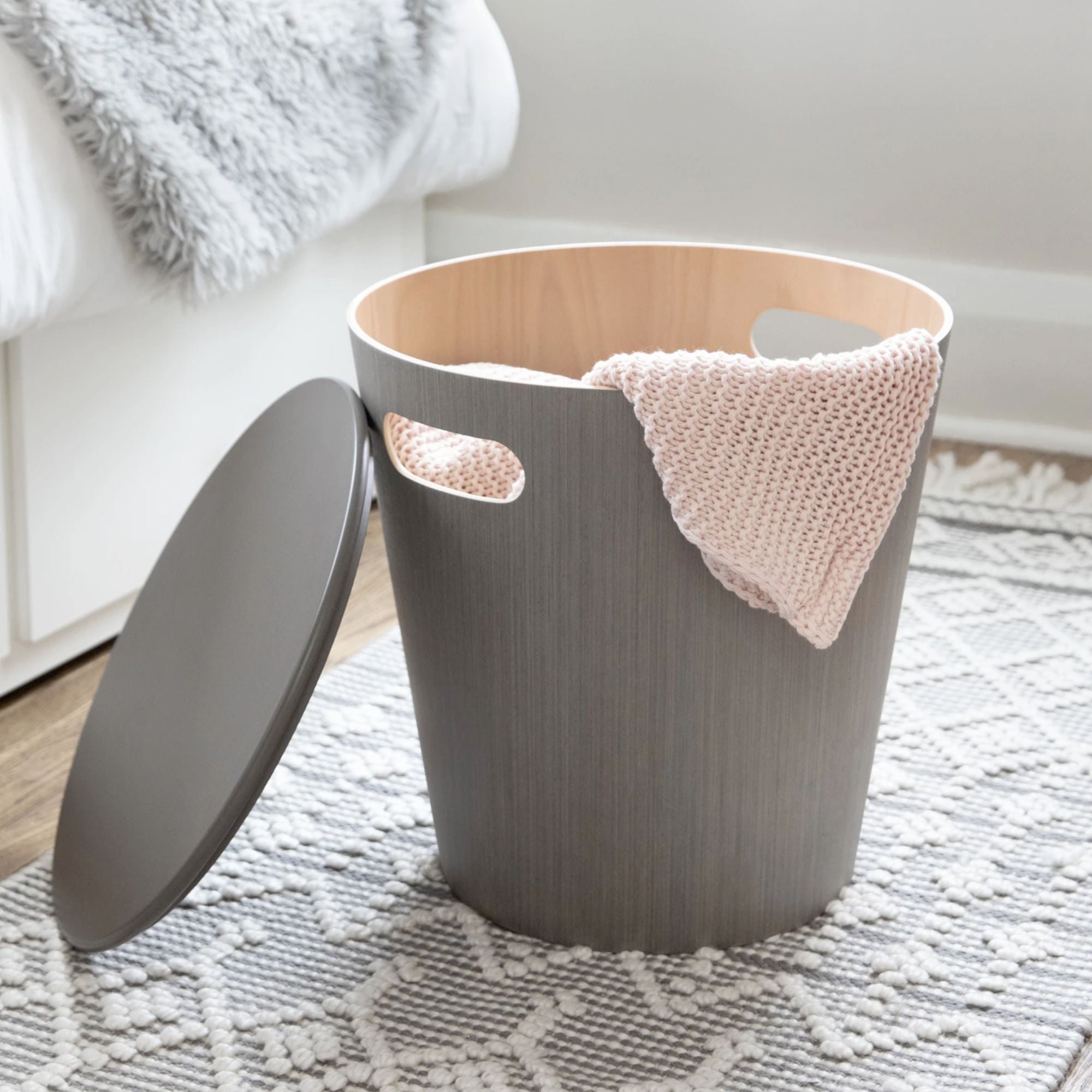 Umbra Woodrow storage stool. Grey