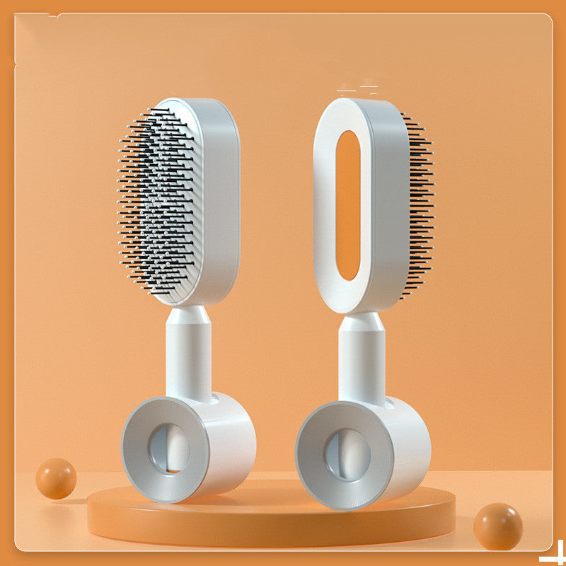 Self-cleaning hairbrush for women. One-button cleaning airbag to prevent hair loss