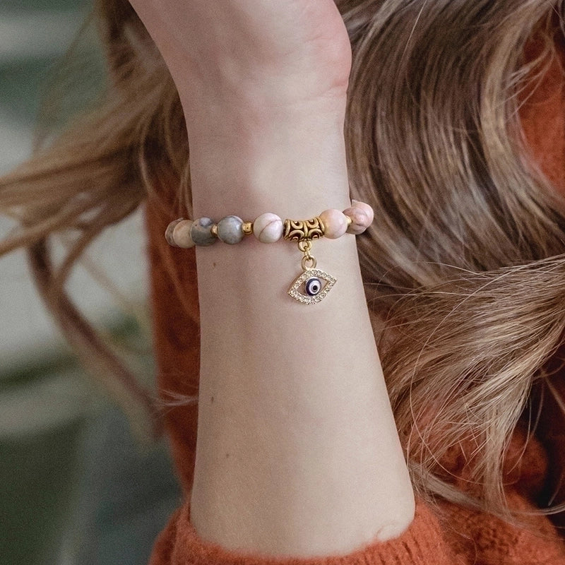 Retro Ethnic Style Devil'S Eye Alloy Natural Stone Elastic String Woven Chain Bracelets In Bulk