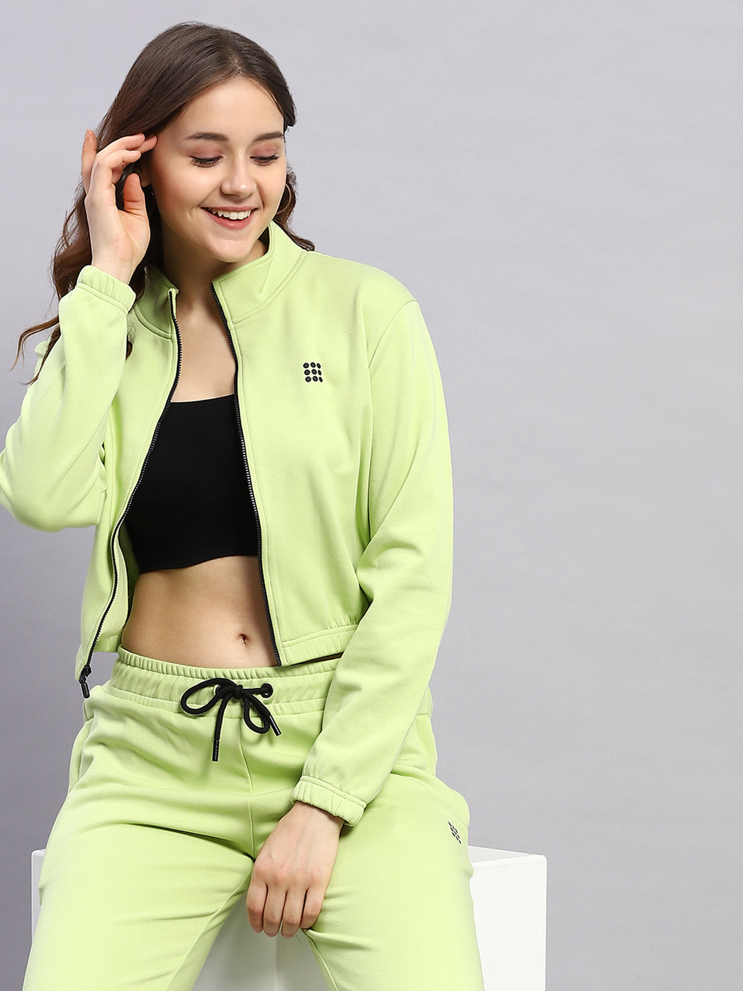 Women Green Solid Mock Neck Full Sleeve Tracksuit