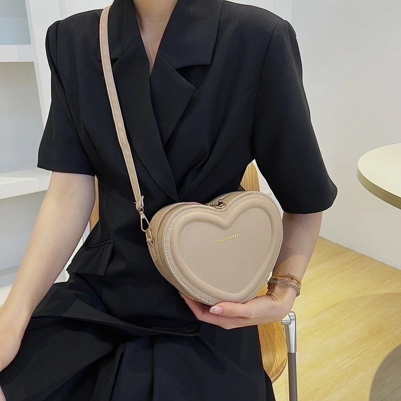 Women's Small Pu Leather Solid Color Fashion Heart-shaped Zipper Crossbody Bag