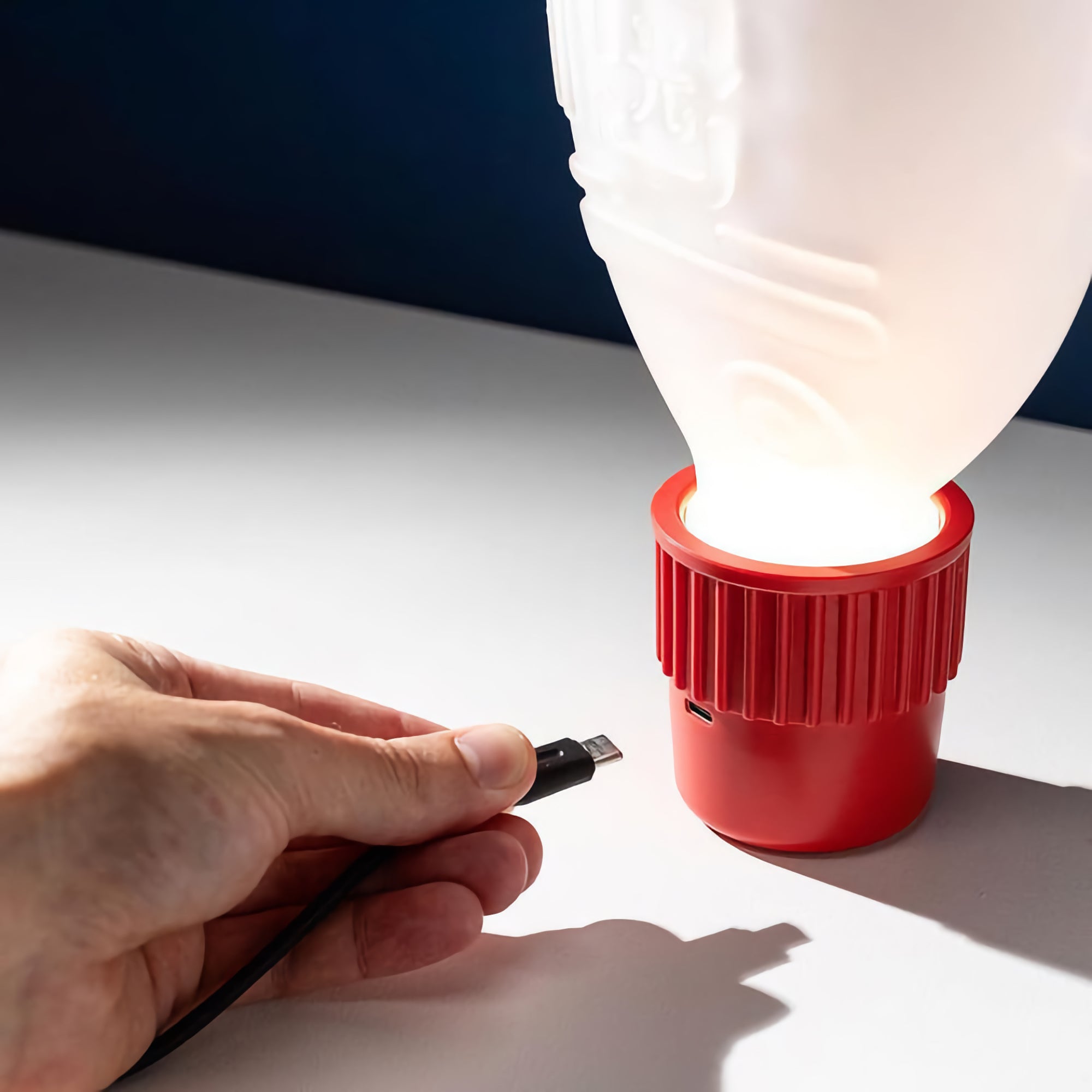 Heliograf Light Soy portable table lamp