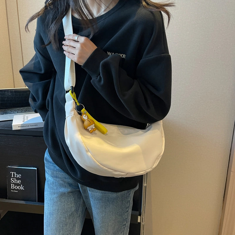 Women's Oxford Cloth Solid Color Streetwear Ornament Dumpling Shape Zipper Crossbody Bag