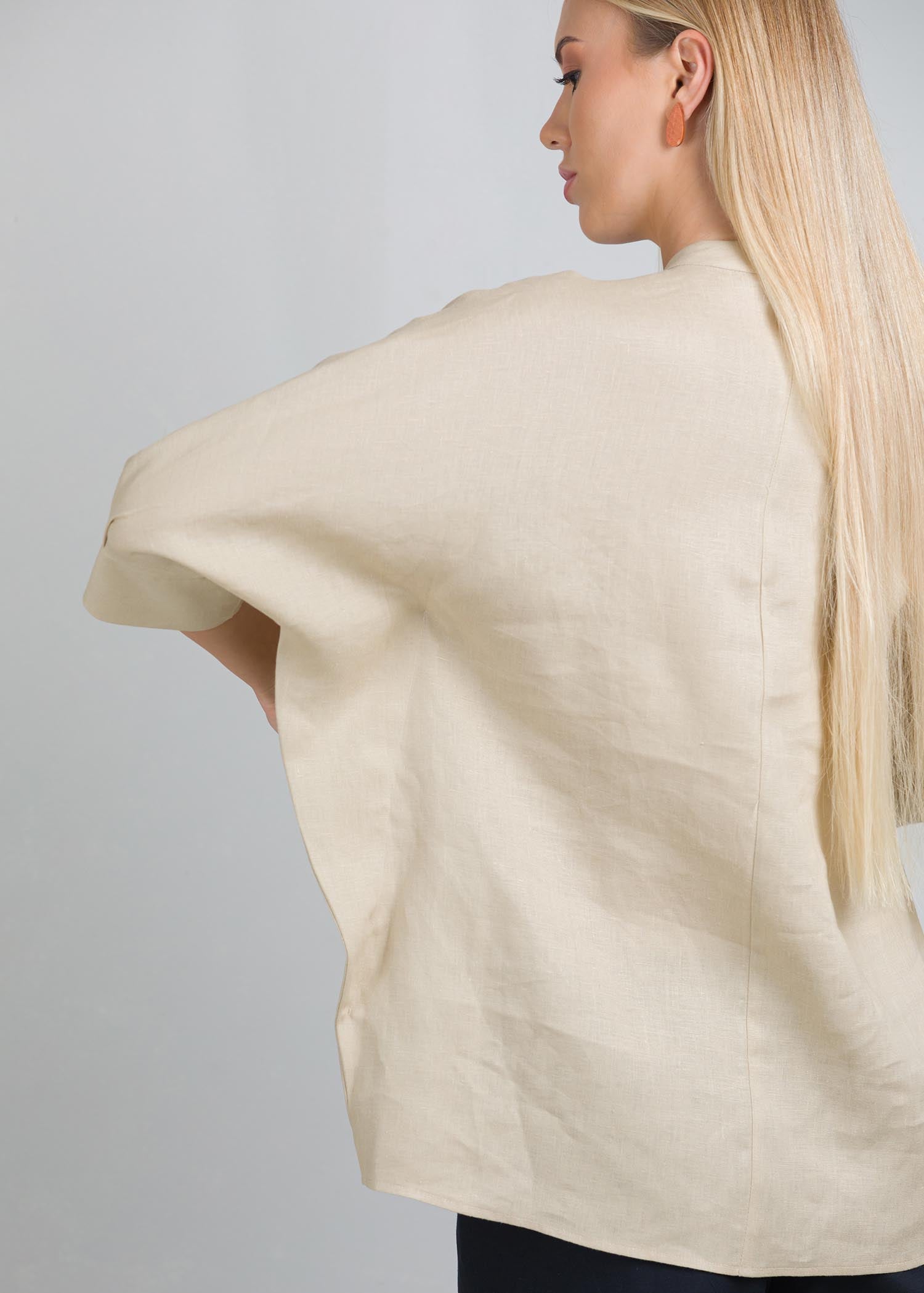 Oversized blouse with front pleat