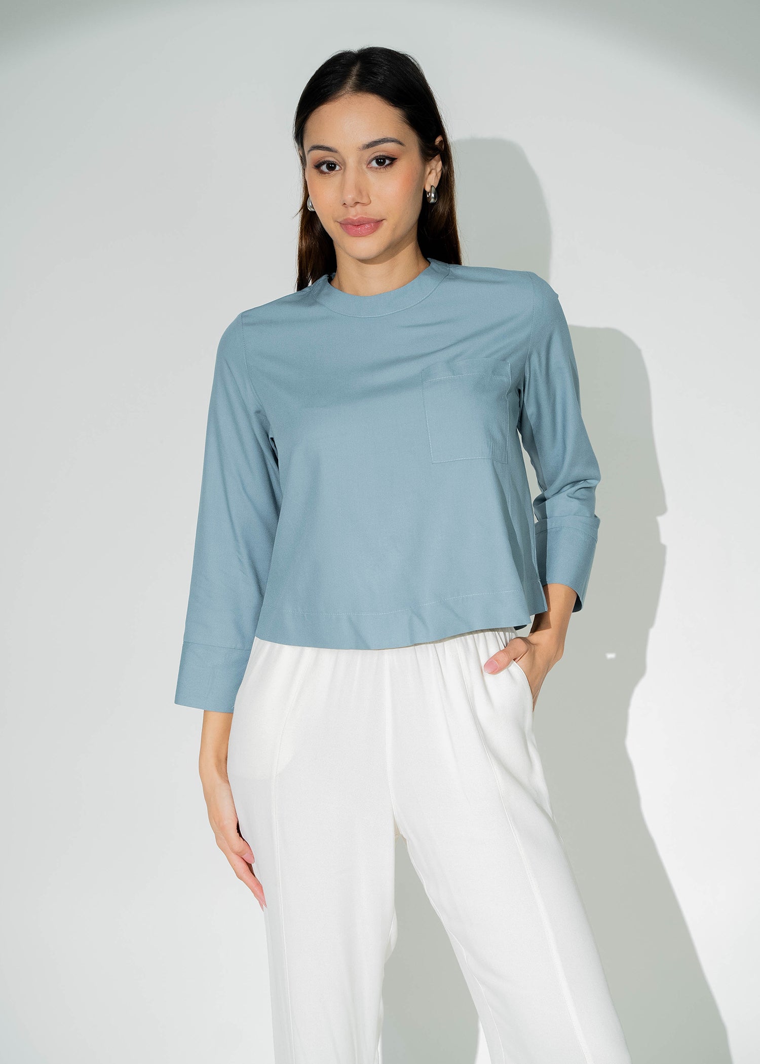 Basic round neck blouse with front pocket