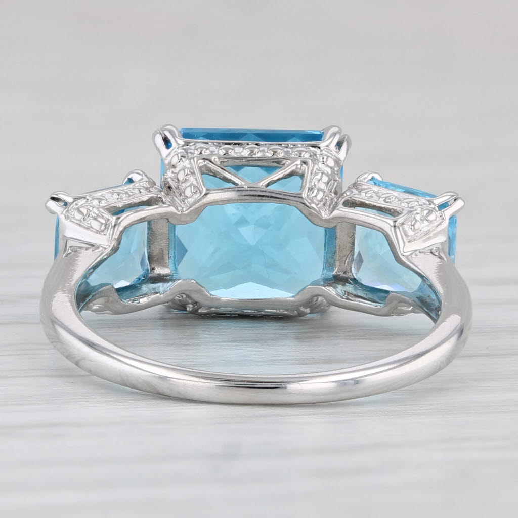 6.37ctw Blue Topaz 3-Stone Ring 10k White Gold Size 7 Diamond Accents