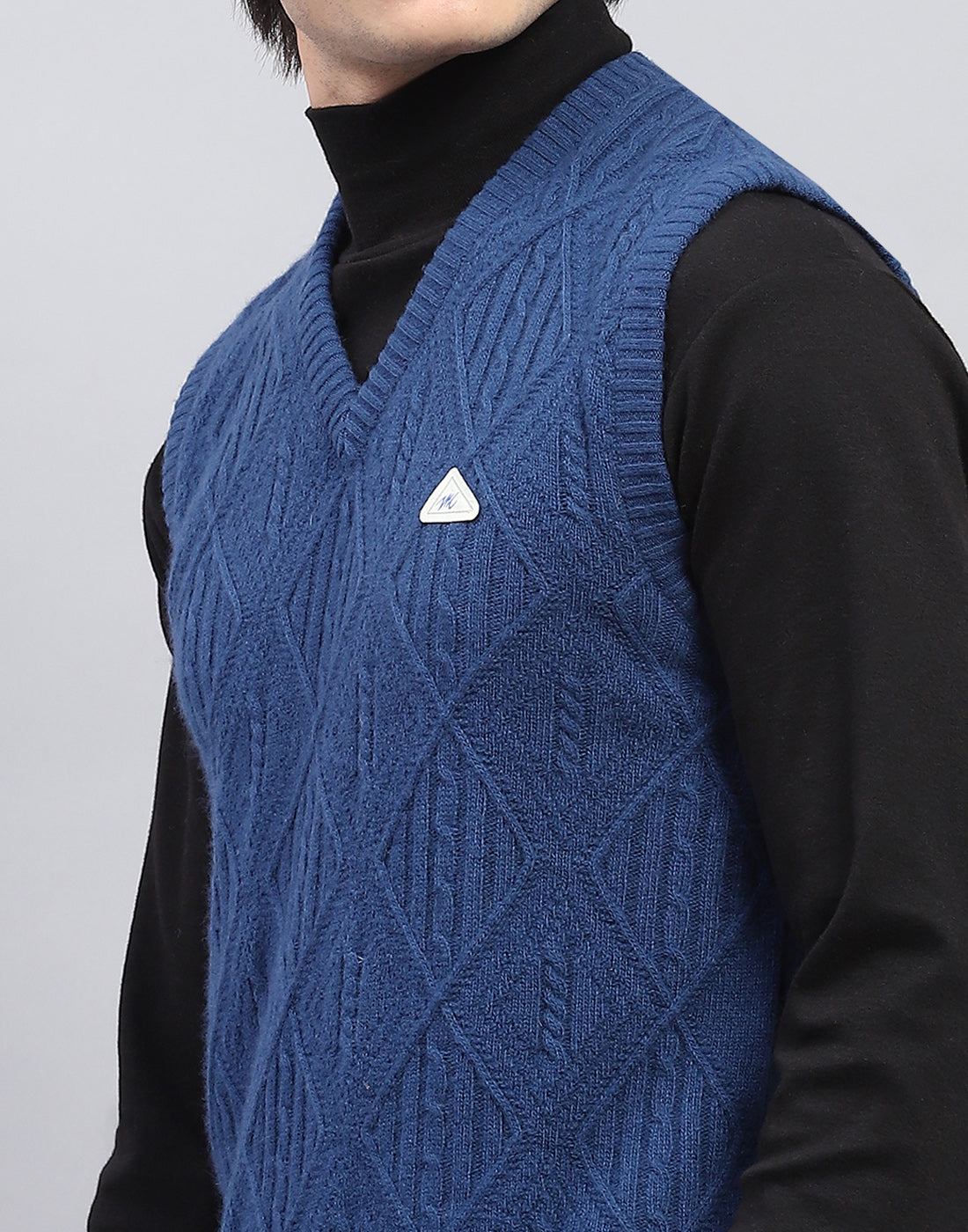 Men Blue Self Design V Neck Sleeveless Sweater