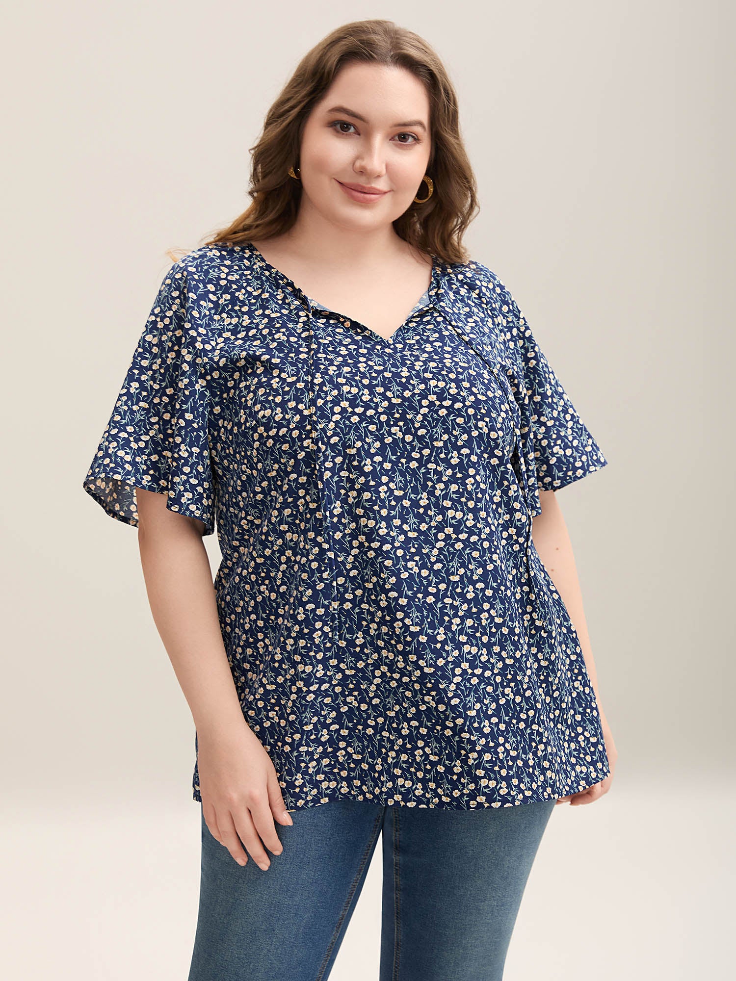 Floral Printed Lotus Sleeve Tied Blouse