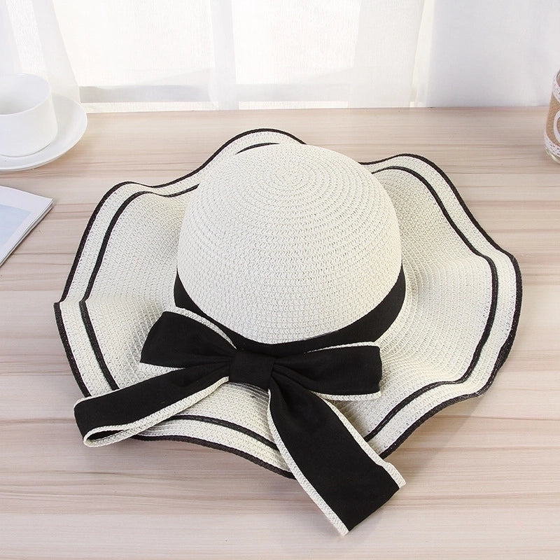 Women's Elegant Pastoral Minimalist Waves Bowknot Big Eaves Straw Hat